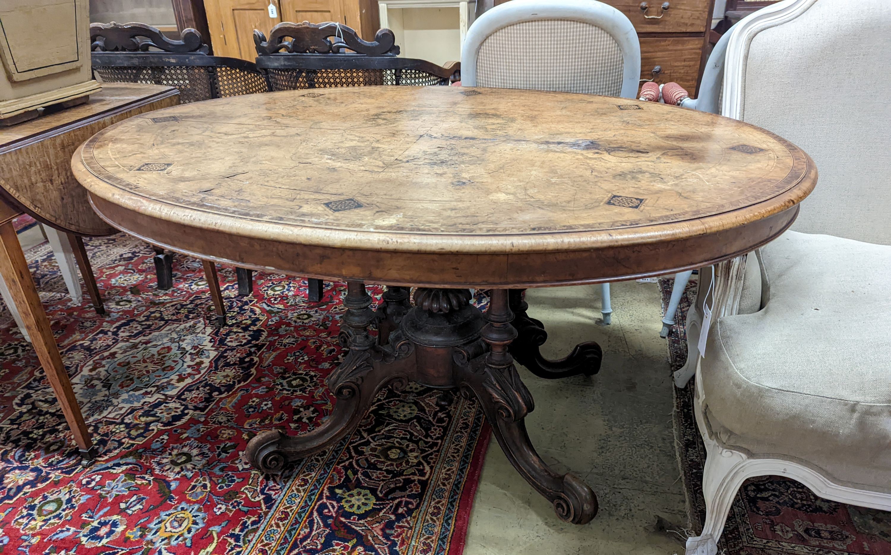 A Victorian inlaid figured walnut and Tunbridge ware oval loo table, width 134cm, depth 100cm, height 70cm